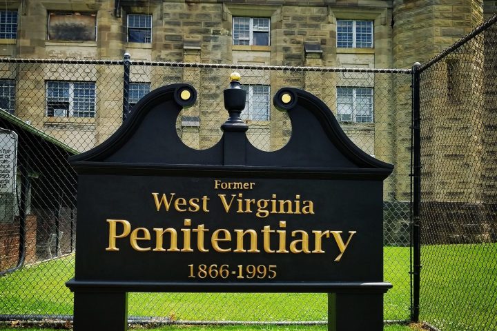 a sign in front of a building