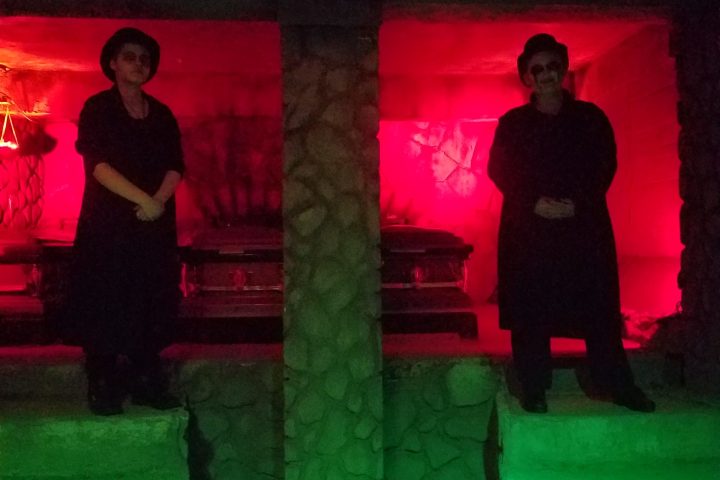 a group of people in a dark room