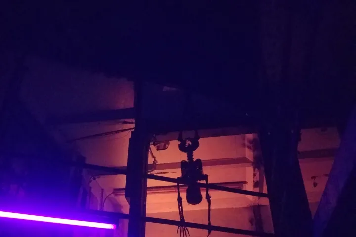 a traffic light is lit up at night